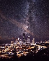 milky way over a city 