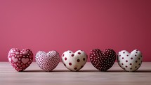 Valentine's day background with red hearts on wooden table.