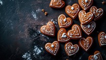 Gingerbread cookies in the form of hearts on a dark background