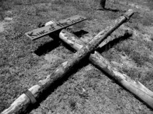 The old rugged cross made of wood with the words "King of the Jews" that the romans included to mock Jesus as they crucified him on the cross at Golgotha, the place of the skull. 