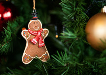gingerbread man ornament on a Christmas tree