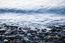 rocks on a lake shore 