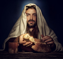 Jesus breaking bread at the Last Supper 
