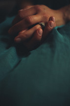 a woman's praying hands 