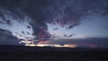 Beautiful Cloudy Sunset Somewhere in Utah with Rock Mountain in The Background