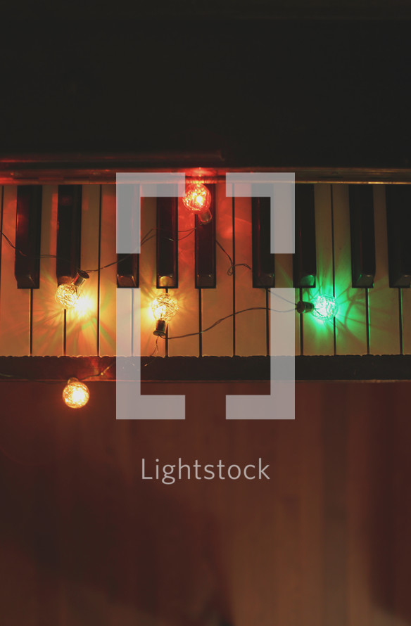 Christmas lights on a piano 