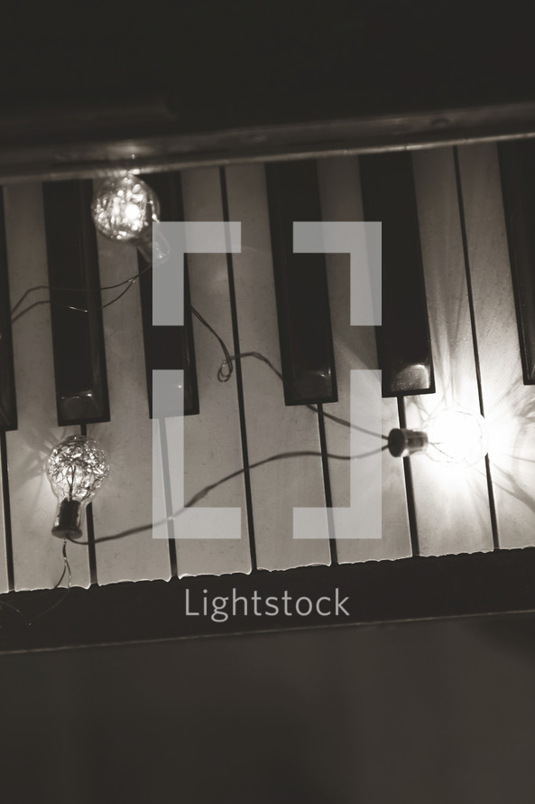 lights on vintage piano keyboard