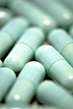 Light green gel cap medicine capsules.