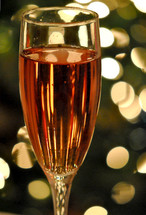A glass of wine with bokeh background