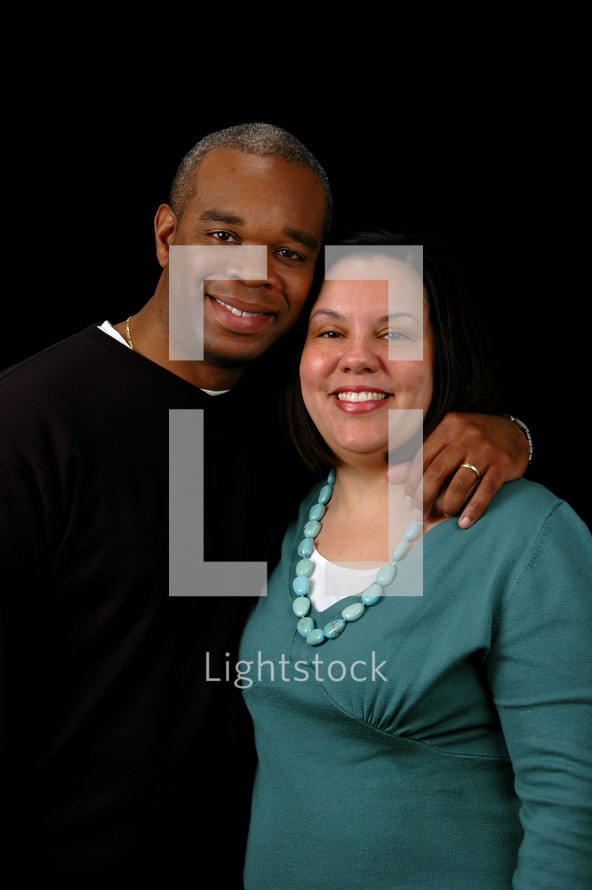 Interracial Couple smiling 
