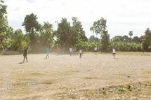 children playing outdoors in Haiti
