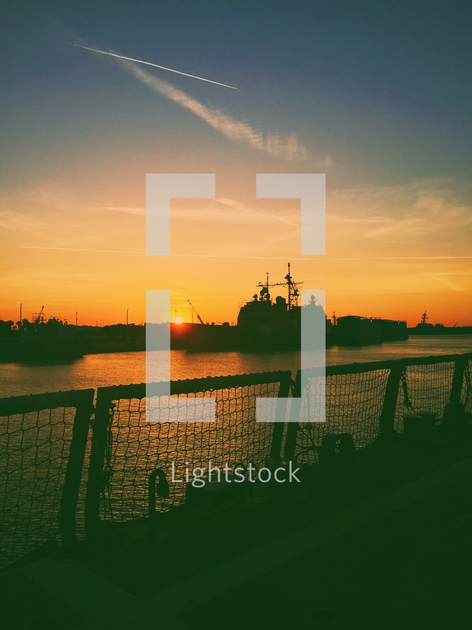 silhouette of a ship at sunset 