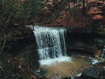 waterfall into a swim hole 