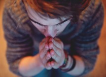 A man in reverent prayer 