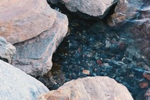 pebbles and stones in a river bed 