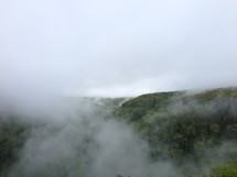 fog at the top of a mountain