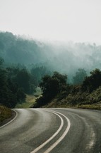 fog over a mountain road 