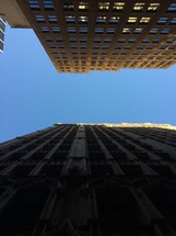 looking up between buildings 