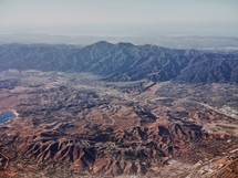aerial view above a mountain range 