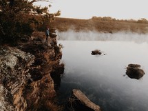 morning steam rising from a lake 