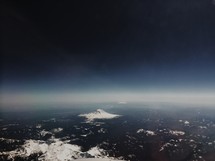 Snow covered mountain tops seen from above