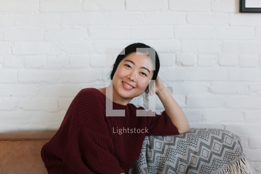 a portrait of a smiling woman 