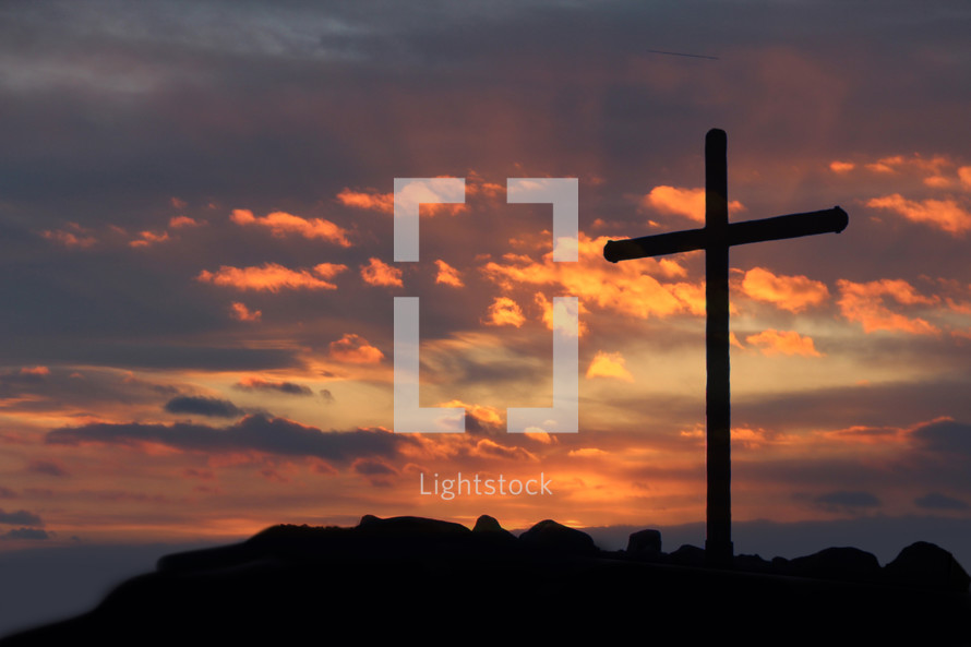 cross silhouette at sunrise 