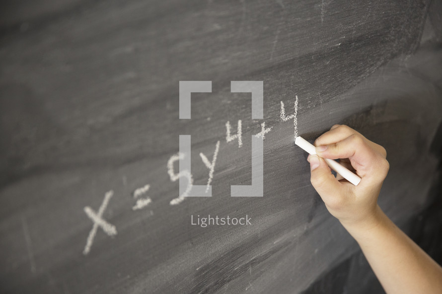 an equation on a chalkboard