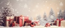 Christmas background with decorations and gift boxes on snow. Copy space.