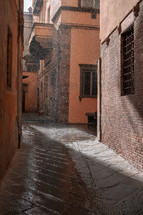 wet cobblestone street 