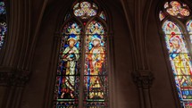 Beautiful church stained glass windows with biblical scenes 