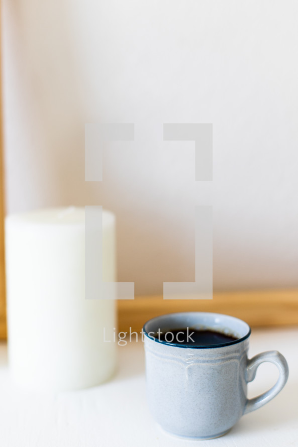 coffee cup and candle 