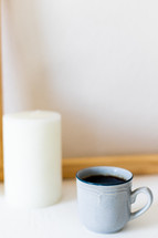 coffee cup and candle 