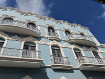 blue building with window terraces 
