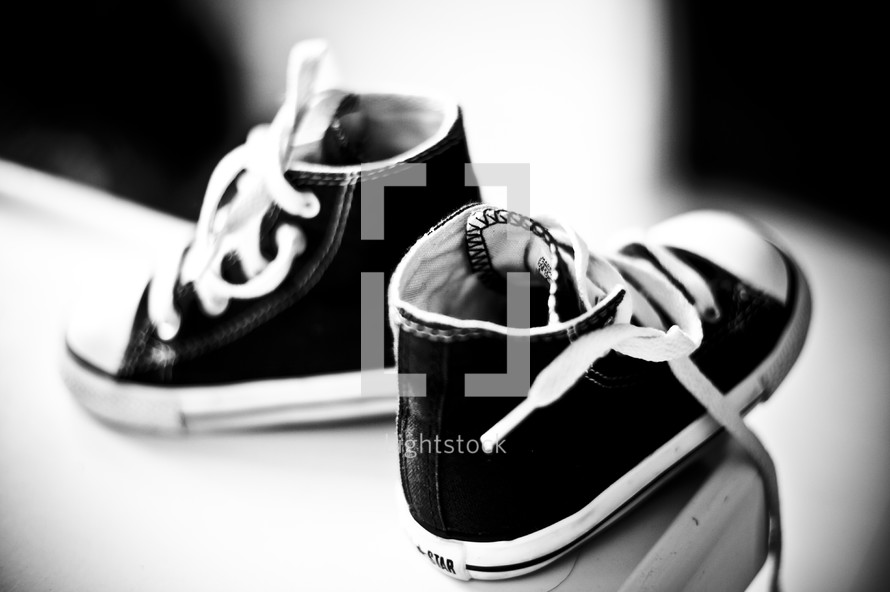 Pair of Converse All-Star tennis shoes.