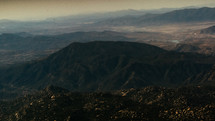 aerial view above mountains below