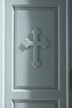 white cross on a door 