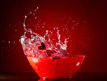water splashing out of a bowl 