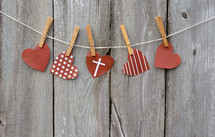paper hearts on a clothesline 