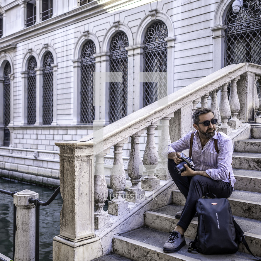 a man traveling in Venice, Italy 