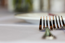 forks at a place setting 
