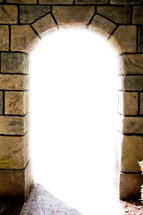 light through an arched doorway