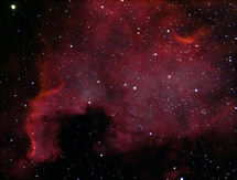A large red nebula in outer space