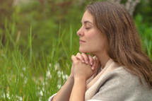 a woman in prayer 
