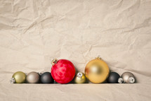 Christmas ornaments on a crumbled paper 