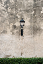 lamp on a concrete wall 