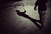 boy walking and a shadow