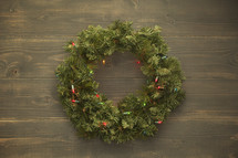 Christmas wreath on wood background 