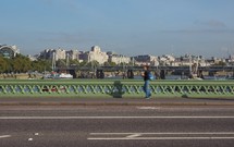 view from Westminster Bridge in London with unrecognisable motion blur woman
