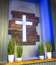 illuminated cross on an altar 
